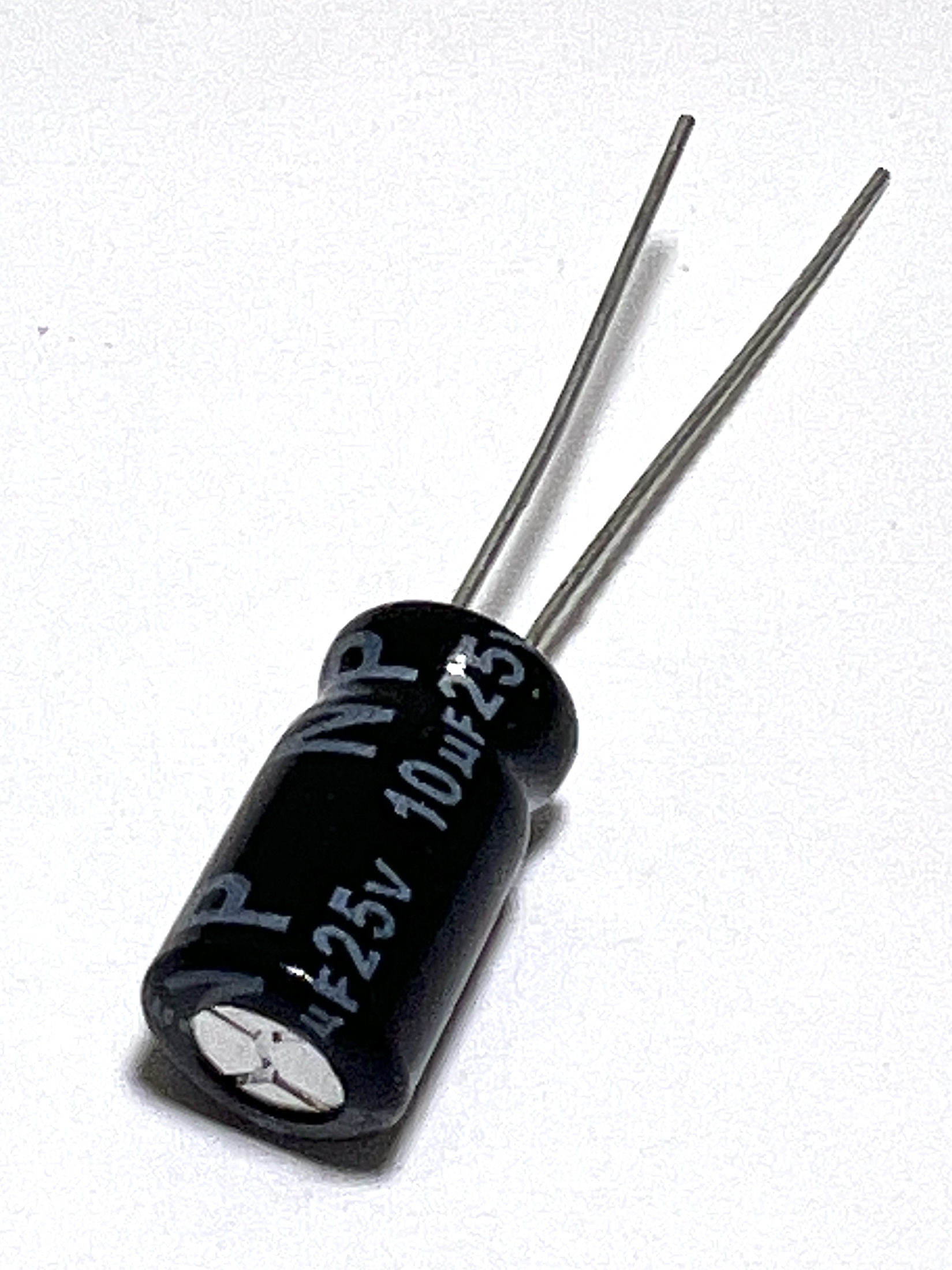 Конденсатор10mF x 25 В 85NKR NP 5x12 Jamicon неполярный